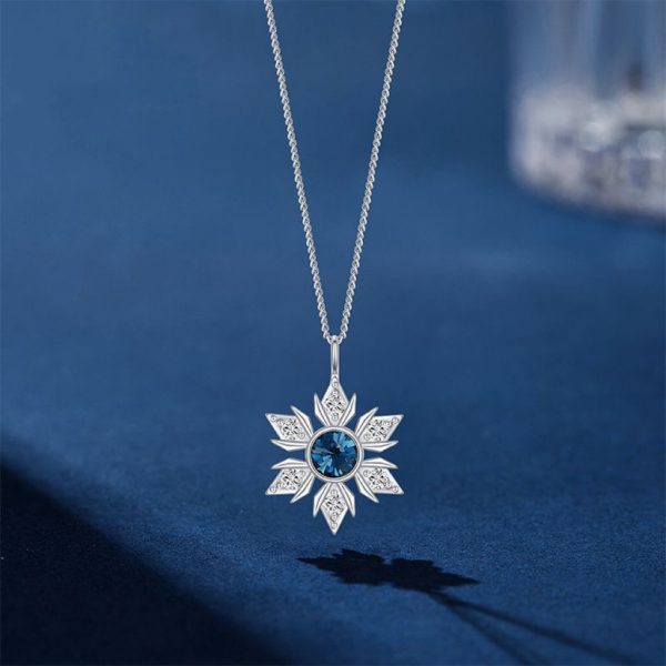 The new model features a Swarovski crystal snowflake necklace - Image 2