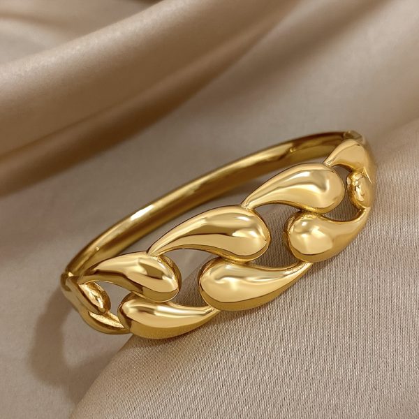Chic Golden-Tone Stainless Steel Bangle with Unique Water Drop Design for Women - Perfect for Casual Attire - Image 2