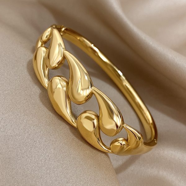 Chic Golden-Tone Stainless Steel Bangle with Unique Water Drop Design for Women - Perfect for Casual Attire - Image 5