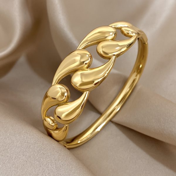 Chic Golden-Tone Stainless Steel Bangle with Unique Water Drop Design for Women - Perfect for Casual Attire - Image 3